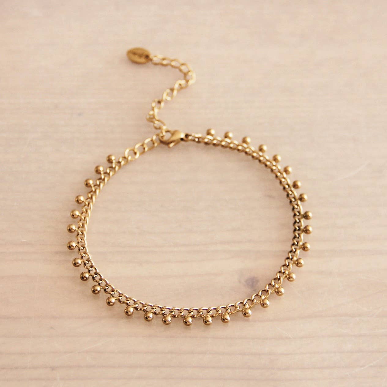 Pulsera de cadena de acero con bolas - oro