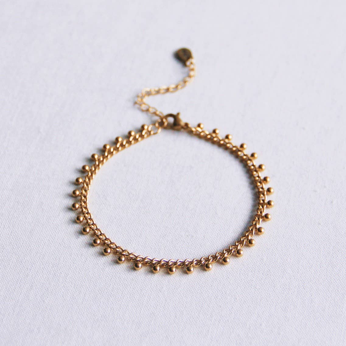 Pulsera de cadena de acero con bolas - oro